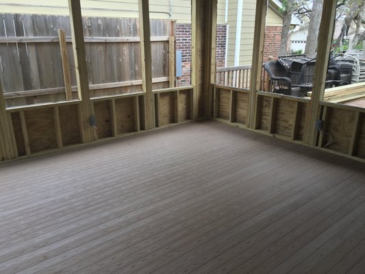 New screened in porch with vinyl plank flooring - This was built as 20 x15 foot addition to the home with it's own entrance- Solid vinyl planks for the flooring on top of a new pressure treated subdeck.