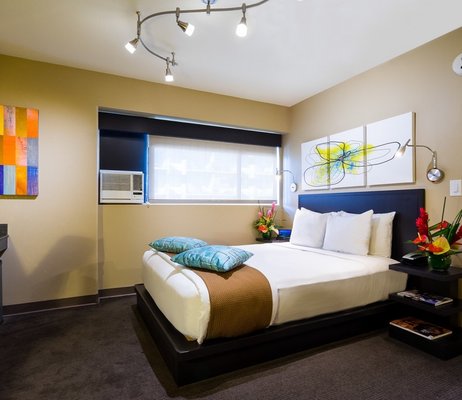 Cosmopolitan Family Suite - Revel in the easy pace of island time with the whole family! Perfect for families and groups traveling together, these 440-square-foot rooms ensure everyone has what they need - two bathroom, two showers, two closet and two TV's. Plus these suites feature two queen beds decked out with cotton linens and duvet comforters for heavenly sleep. A soothing palette with bursts of color makes this the perfect escape. Cosmopolitan Family Suite - Revel in the easy pace of island time with the whole family! Perfect for families and groups traveling together, these 440-square-foot rooms ensure everyone has what they need - two bathroom, two showers, two closet and two TV's. Plus these suites feature two queen beds decked out with cotton linens and duvet comforters for heavenly sleep. A soothing palette with bursts of color makes this the perfect escape.