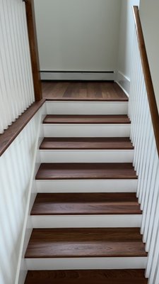 Brazilian cherry floor refinish including stairs. Loba easy was used, no stain. - This floor refinished was done back in 2021. This is a Brazilian cherry floor that was stripped of its own. Finish and finished with lona easy finish natural both floor and stairs were done.