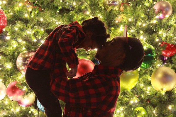 Daddy Daughter Christmas - This extremely playful photo shoot with this incredible family was such a pleasure to work with! This father wanted a memory that would stick with him forever so my ultimate goal was to bring out the playfulness and love that they shared for one another.