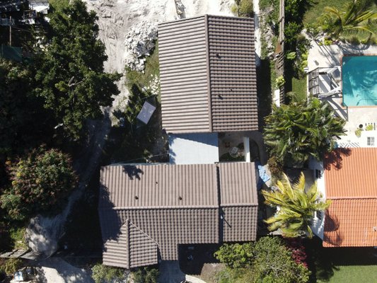 Biscayne Park Roof Replacement - This roof replacement was done on an old tile and flat roof that was in bad shape. We helped these Biscayne Park homeowners revamp their roof with a BORAL, BARCELONA 900, ESPRESSO BLEND tile Biscayne Park Roof Replacement - This roof replacement was done on an old tile and flat roof that was in bad shape. We helped these Biscayne Park homeowners revamp their roof with a BORAL, BARCELONA 900, ESPRESSO BLEND tile