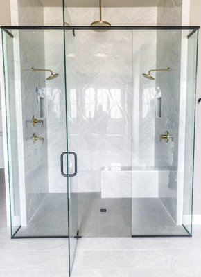 Cave Springs Project - For this project located in Cave Springs, AR we completed two shower installations and set mirrors in custom frames.