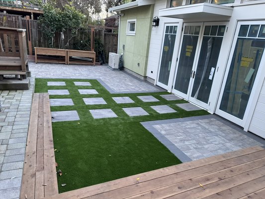 Custom Backyard
Design & Build –
Hardscape, Deck & Lighting - This full backyard transformation was designed and built to create a functional, modern outdoor living space tailored to the property’s layout and elevation.
The project included custom paver installation, a wood deck, artificial turf, decorative gravel, planting, and integrated outdoor lighting—all developed from a detailed design plan prior to construction.
The result is a cohesive, high-end backyard that balances aesthetics, functionality, and low-maintenance outdoor living. Custom Backyard
Design & Build –
Hardscape, Deck & Lighting - This full backyard transformation was designed and built to create a functional, modern outdoor living space tailored to the property’s layout and elevation.
The project included custom paver installation, a wood deck, artificial turf, decorative gravel, planting, and integrated outdoor lighting—all developed from a detailed design plan prior to construction.
The result is a cohesive, high-end backyard that balances aesthetics, functionality, and low-maintenance outdoor living.