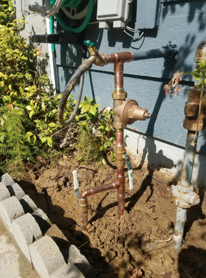Water service repair - Owner had a broken water main and this home had one old gate valve to shut off both the home and irrigation. We repaired the pvc to copper connection underground with a mechanical coupling so the water could be restored immediately upon completion. We separated the house and irrigation lines and gave them new ball valves so they could shut them off independently. We also installed a new water pressure regulator and a new hose bib as requested by the owner. Water service repair - Owner had a broken water main and this home had one old gate valve to shut off both the home and irrigation. We repaired the pvc to copper connection underground with a mechanical coupling so the water could be restored immediately upon completion. We separated the house and irrigation lines and gave them new ball valves so they could shut them off independently. We also installed a new water pressure regulator and a new hose bib as requested by the owner.