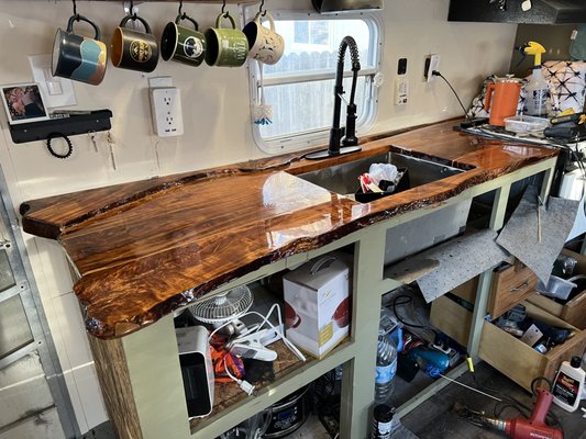 Custom counter top in travel trailer - This was done in a travel trailer using live edge birch slabs feature an additional live edge at the rear. Custom counter top in travel trailer - This was done in a travel trailer using live edge birch slabs feature an additional live edge at the rear.