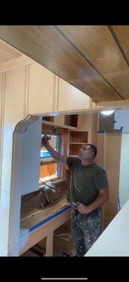 preparing and painting the kitchen - This project involved preparing and painting the kitchen
