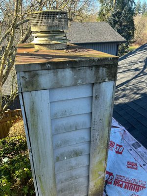 Pre Fabricated Chimney Rebuild - This was a full restoration of a damaged pre-fabricated chimney. The wood siding was deteriorated and the old chase cover was rusted and leaking. We rebuilt the exterior, installed new siding panels, sealed all gaps, and added a brand-new custom metal chase cover with a new cap. The chimney is now fully protected from water damage and looks like new again. Pre Fabricated Chimney Rebuild - This was a full restoration of a damaged pre-fabricated chimney. The wood siding was deteriorated and the old chase cover was rusted and leaking. We rebuilt the exterior, installed new siding panels, sealed all gaps, and added a brand-new custom metal chase cover with a new cap. The chimney is now fully protected from water damage and looks like new again.