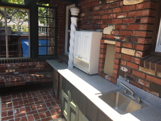 Backyard remodeling - This remodel was done to an old backyard with mossy bricks, we also painted some old furniture and added new one