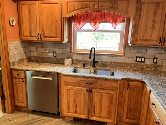 Replaced outdated backsplash. - Replaced outdated tile back splash to update kitchen. Replaced outdated backsplash. - Replaced outdated tile back splash to update kitchen.