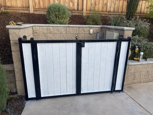 Custom hand made fence with gate - Custom made fence with gate to close pool equipment.