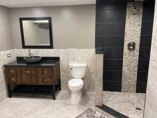 Master Bathroom Remodel - This was a full remodel on a huge master bathroom! All new accessories, new tile floor, wall tile, a half shower wall, and a new shower with two niche boxes!