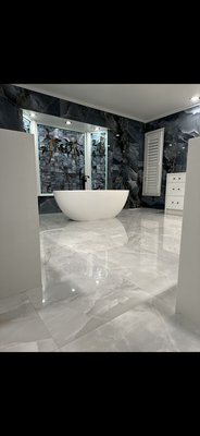 Modern bathroom remodel - This is an amazing modern bathroom. This job was completed in 2 weeks! Beautiful porcelain flooring, full porcelain walls, matching shower, European style cabinets. Every detail is beautiful in this bathroom! Modern bathroom remodel - This is an amazing modern bathroom. This job was completed in 2 weeks! Beautiful porcelain flooring, full porcelain walls, matching shower, European style cabinets. Every detail is beautiful in this bathroom!