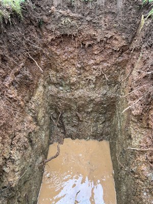 When a property is denied for a septic system, it doesn't always mean the land is unbuildable. - This project in Josephine County, Oregon came to IronRoot Construction after an initial septic site evaluation resulted in a denial. The original test pits were excavated in locations that encountered a high seasonal water table, leading to the property being considered unsuitable for a standard septic system.
After reviewing the site, soil conditions, and permitting requirements, IronRoot Construction performed a comprehensive septic consultation and identified more suitable test locations. The additional evaluation demonstrated that the property met Oregon DEQ requirements for a standard septic system, allowing the homeowner to receive septic approval and move forward with building their new home.
Many septic denials can be overcome with the right experience, proper site evaluation, and a thorough understanding of Oregon's onsite wastewater regulations. As a former Oregon DEQ and county Registered Environmental Health Specialist (REHS) septic inspector, I help homeowners navigate septic permits, site evaluations, authorization notices, existing system evaluations, and challenging septic issues throughout Southern Oregon.
If you've been told your property won't qualify for a septic system, received a septic denial, or need help understanding your options, IronRoot Construction can help you find the most practical path forward. When a property is denied for a septic system, it doesn't always mean the land is unbuildable. - This project in Josephine County, Oregon came to IronRoot Construction after an initial septic site evaluation resulted in a denial. The original test pits were excavated in locations that encountered a high seasonal water table, leading to the property being considered unsuitable for a standard septic system.
After reviewing the site, soil conditions, and permitting requirements, IronRoot Construction performed a comprehensive septic consultation and identified more suitable test locations. The additional evaluation demonstrated that the property met Oregon DEQ requirements for a standard septic system, allowing the homeowner to receive septic approval and move forward with building their new home.
Many septic denials can be overcome with the right experience, proper site evaluation, and a thorough understanding of Oregon's onsite wastewater regulations. As a former Oregon DEQ and county Registered Environmental Health Specialist (REHS) septic inspector, I help homeowners navigate septic permits, site evaluations, authorization notices, existing system evaluations, and challenging septic issues throughout Southern Oregon.
If you've been told your property won't qualify for a septic system, received a septic denial, or need help understanding your options, IronRoot Construction can help you find the most practical path forward.