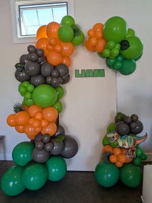 Dinosaur theme party - This was a dinosaur themed birthday party that we executed in a venue in Mill Valley, California. we provided the bounce house all the kids decorations and table settings along with backdrop and balloons.