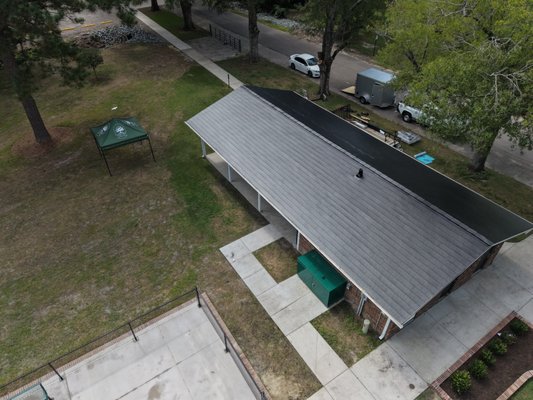 Timbersteel roof - We installed a full GAF TimberSteel roof on this park in Burgaw NC. TimberSteel looks like classic architectural shingles but is made of steel, so the homeowner gets curb appeal along with stronger protection against wind, storms and NC heat.

The job covered tear-off of the old roof, a deck inspection, new leak barrier and ventilation, and TimberSteel installed to GAF's specifications. Our crew kept the site clean each day and did a full walkthrough with the homeowner at the end.

As a GAF Metal Certified contractor, we give every roof this level of care, whether it's steel, shingle or storm repair.