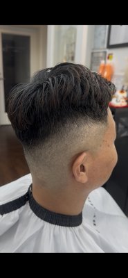 Men’s High Skin Fade Haircut - Men’s high skin fade transformation with a clean, smooth blend while keeping length and texture on top. Men’s High Skin Fade Haircut - Men’s high skin fade transformation with a clean, smooth blend while keeping length and texture on top.