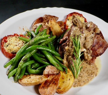 Private Chef Entre: Steak au Poivre - The Steak with Black peppercorn cream sauce is part of our Bistro class and dinner. This summer it has been one of the most requested dish.
A filet (Tenderloin) grilled to perfection and flambé with Brandi (Cognac). It is finished in a peppercorn cream sauce. Served with french beans and roasted fingerling potatoes with a side of Tomato Provençal. 
This classic always please the steak lovers.

Review from Dawn Carolee
February 2023
Alex and Amy were wonderful hosts who provided an amazing culinary experience at their welcoming home in old town. We enjoyed each other’s company while being entertained by Alex—with his interesting stories, while sharing his skills. Three of us foodies became quick friends while creating a mouth watering meal, which we savoured after being teased by the aroma that filled the air! You won’t find a better meal at any restaurant, as ingredients were super fresh, of finest quality with freshly picked herbs from their garden, appetizers, healthy (GF/DF accommodated) meal and dessert. I would definitely go back for more and highly recommend for individuals, couples or small groups. 5-STAR FUN for FOODIES! 😊enJOY!