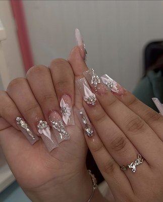 Nails - Welcome to our nail salon! We offer a wide range of high-quality nail services that are sure to leave you feeling pampered and refreshed. Our experienced and friendly staff are dedicated to providing you with the best possible experience, whether you're coming in for a quick manicure or a full set of acrylics.
We understand that your time is valuable, which is why we strive to make every appointment as efficient and enjoyable as possible. Our salon is clean, modern, and relaxing, with comfortable seating and soothing music to help you unwind.
We use only the best products and techniques to ensure that your nails look and feel their best. From classic French tips to trendy nail art, we can help you achieve the perfect look for any occasion. And with our competitive pricing and frequent specials, you can enjoy the luxury of high-quality nail care without breaking the bank.
So why wait? Treat yourself to a little self-care and book your appointment today. We can't wait to see you! Nails - Welcome to our nail salon! We offer a wide range of high-quality nail services that are sure to leave you feeling pampered and refreshed. Our experienced and friendly staff are dedicated to providing you with the best possible experience, whether you're coming in for a quick manicure or a full set of acrylics.
We understand that your time is valuable, which is why we strive to make every appointment as efficient and enjoyable as possible. Our salon is clean, modern, and relaxing, with comfortable seating and soothing music to help you unwind.
We use only the best products and techniques to ensure that your nails look and feel their best. From classic French tips to trendy nail art, we can help you achieve the perfect look for any occasion. And with our competitive pricing and frequent specials, you can enjoy the luxury of high-quality nail care without breaking the bank.
So why wait? Treat yourself to a little self-care and book your appointment today. We can't wait to see you!