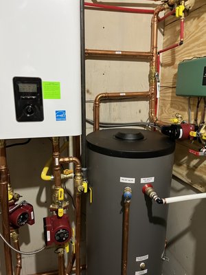 Boiler and hydronic loop replacement - Installed a new Navien boiler, NTI indirect water heat and salt-free alternative to soft water Boiler and hydronic loop replacement - Installed a new Navien boiler, NTI indirect water heat and salt-free alternative to soft water