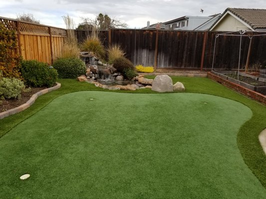 Putting Greens - Bring the golf course to your backyard!
No mowing, nom watering, no driving to the course. Our custom artificial putting greens are designed for year-round beauty, durability, and fun. Putting Greens - Bring the golf course to your backyard!
No mowing, nom watering, no driving to the course. Our custom artificial putting greens are designed for year-round beauty, durability, and fun.