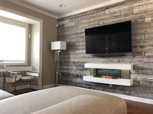 Modern Living Room - Real barn wood wall planks, Modern decor - electrical floating fireplace, TV + soundbar integration. Modern Living Room - Real barn wood wall planks, Modern decor - electrical floating fireplace, TV + soundbar integration.
