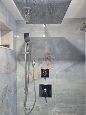 Bathroom Remodel - Upgraded Walk-In Shower for Ultimate Comfort - Transform your bathroom into a luxurious retreat with a custom bathroom remodel by Midtowne Plumbing & Heating. For one recent client, we upgraded their walk-in shower with a larger showerhead and a state-of-the-art shower valve, enhancing both functionality and style. Whether you’re looking for a more spacious shower or better water pressure, we specialize in creating personalized bathroom spaces that meet your needs. Let us help you turn your vision into reality—contact us today for a consultation! Bathroom Remodel - Upgraded Walk-In Shower for Ultimate Comfort - Transform your bathroom into a luxurious retreat with a custom bathroom remodel by Midtowne Plumbing & Heating. For one recent client, we upgraded their walk-in shower with a larger showerhead and a state-of-the-art shower valve, enhancing both functionality and style. Whether you’re looking for a more spacious shower or better water pressure, we specialize in creating personalized bathroom spaces that meet your needs. Let us help you turn your vision into reality—contact us today for a consultation!