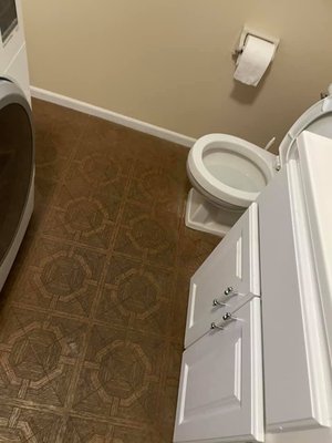 Tile work - In this project we did a renovation on his half laundry / half bathroom , and removed the old tile from the entrance and hallway and install new one