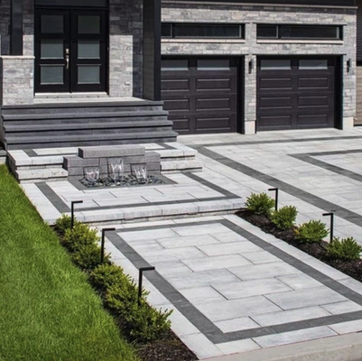 Hardscaping and Concrete - We offer a wide range of hardscaping and concrete services to enhance the beauty and functionality of your outdoor space. Our team of experts will work with you to design and install custom walkways, patios, retaining walls, and other hardscaping elements that complement your landscape. Whether you're looking to create a new outdoor entertaining area, increase the curb appeal of your property, or solve a practical problem like erosion or slope stabilization, we have the skills and experience to make it happen. Our hardscaping and concrete services are designed to provide long-lasting durability and beauty, and we use only the highest-quality materials and workmanship to ensure your complete satisfaction. Hardscaping and Concrete - We offer a wide range of hardscaping and concrete services to enhance the beauty and functionality of your outdoor space. Our team of experts will work with you to design and install custom walkways, patios, retaining walls, and other hardscaping elements that complement your landscape. Whether you're looking to create a new outdoor entertaining area, increase the curb appeal of your property, or solve a practical problem like erosion or slope stabilization, we have the skills and experience to make it happen. Our hardscaping and concrete services are designed to provide long-lasting durability and beauty, and we use only the highest-quality materials and workmanship to ensure your complete satisfaction.