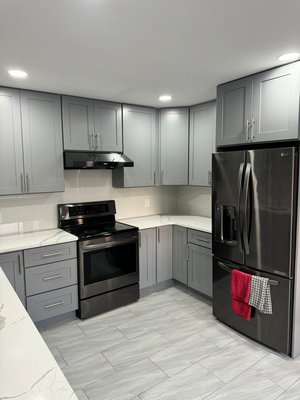 Kitchen remodel.Holland PA 18966 - In this project, we completely replaced the kitchen areas, including electricity, outlets, plumbing, floors, tiles, a new kitchen cabinet, sink, faucet, and lighting. Within 2 weeks, you will have a new kitchen and unforgettable emotions.