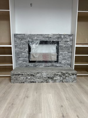 Fire place - This beautiful fire place was a truly a Vision turned into reality. Customer wanted a real natural earthy look that matched the home. Really compliments the paint and style fo the cabinets. Truly a work of art. Fire place - This beautiful fire place was a truly a Vision turned into reality. Customer wanted a real natural earthy look that matched the home. Really compliments the paint and style fo the cabinets. Truly a work of art.