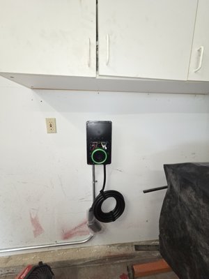 EV Charging circuit and charger install - Ran new wiring 70' through the home and installed a new EV charger EV Charging circuit and charger install - Ran new wiring 70' through the home and installed a new EV charger