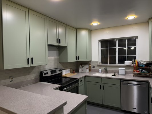 Kitchen painting & refinished - This project involved refinishing the existing kitchen cabinets to give the space a fresh, clean look. The cabinets were prepped, sanded, and professionally painted to match the updated style of the home. The result was a modern, refreshed kitchen without a full remodel.