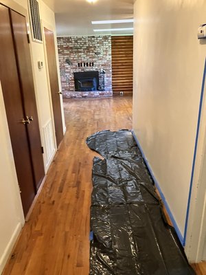 Nile River Drive Remodel - Client bought a vacation home with peeled vinyl and pink paint. 3 Styles of flooring were installed , Entire house was painted.