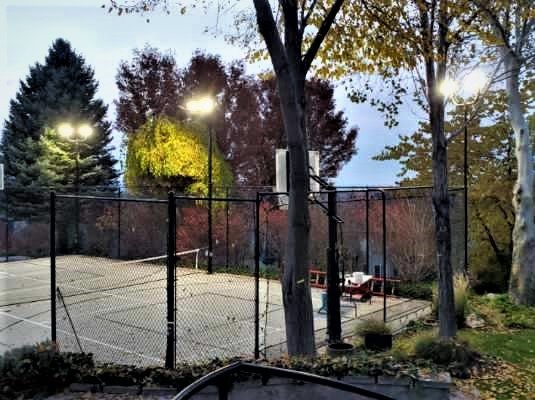 Tennis Court - This customer wanted to get rid of the halogen power hungry lights on their Tennis court and replace them, add more in the corners with high quality LED flood lights.  We also added independent switches and outdoor outlets.