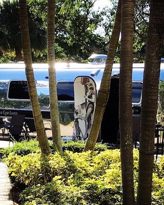 Airstream Mobile Cigar Lounge - This Vintage Airstream has been completely remodeled to resemble the most sophisticated cigar lounge by it owner Steven Casalino .
Equipped with 22,000 btu AC to cool the brutal Florida heat , Bose Surround Sound, Espresso bar ,2 42” smart TV’s , a custom made humidor and led mood lighting throughout.
Allow us to provide a memorable experience for you and your guests. Airstream Mobile Cigar Lounge - This Vintage Airstream has been completely remodeled to resemble the most sophisticated cigar lounge by it owner Steven Casalino .
Equipped with 22,000 btu AC to cool the brutal Florida heat , Bose Surround Sound, Espresso bar ,2 42” smart TV’s , a custom made humidor and led mood lighting throughout.
Allow us to provide a memorable experience for you and your guests.