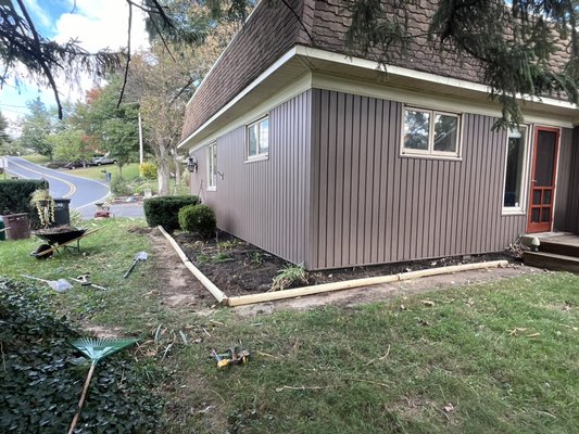 Yard make over - Cleaned up several flower beds that were overgrown. Some beds got new Timbers to keep new mulch in beds.