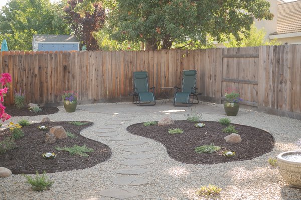 Project 6 - The priority for this landscape was to create a low-maintenance design using smaller plant material, while staying within a budget that still delivers a natural, finished look. The space was built using simple, natural elements—bark, cobble, and plantings—to keep everything cohesive and grounded.
Steel edging was installed throughout for practicality, creating clean separation between gravel and bark while making long-term maintenance easier.
The homeowners were great to work with (genuinely kind and interesting people) and it made the process that much more enjoyable being able to connect with them day to day while bringing the space together. Project 6 - The priority for this landscape was to create a low-maintenance design using smaller plant material, while staying within a budget that still delivers a natural, finished look. The space was built using simple, natural elements—bark, cobble, and plantings—to keep everything cohesive and grounded.
Steel edging was installed throughout for practicality, creating clean separation between gravel and bark while making long-term maintenance easier.
The homeowners were great to work with (genuinely kind and interesting people) and it made the process that much more enjoyable being able to connect with them day to day while bringing the space together.