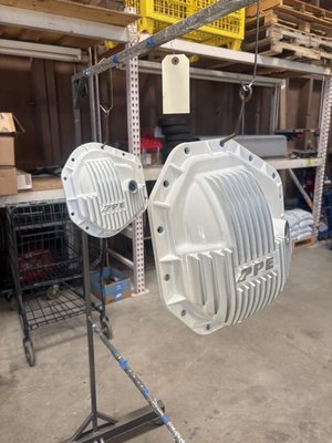 PPE REAR DIFFERENTIAL COVERS - These brand new PPE covers were brought in to match previously coated parts. They were carefully masked with high temp tape, sandblasted, fins were brush polished, white powder applied, vacuumed/ wiped fins, partially baked and then clear coated. PPE REAR DIFFERENTIAL COVERS - These brand new PPE covers were brought in to match previously coated parts. They were carefully masked with high temp tape, sandblasted, fins were brush polished, white powder applied, vacuumed/ wiped fins, partially baked and then clear coated.