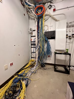 Transforming Connectivity and Security: Empowering MVP Surgical with Cutting-Edge Network and WiFi Solutions - The Challenge:
MVP Surgical leased a new floor and required a comprehensive network, reliable WiFi coverage, and advanced security systems to support their operations. The project involved integrating the new floor with existing infrastructure, managing over 400 ethernet drops, and designing a robust security camera system.

The Solution:
We installed a fiber optic backbone for high-speed connectivity, conducted a WiFi site survey with heatmap analysis, and installed strategically placed access points for seamless coverage. Over 400 ethernet drops were installed with efficient cable management, and a professional rack housed the network devices. A sophisticated camera system with motion detection and tracking features was also deployed for enhanced security.

The Impact:
MVP Surgical now benefits from a reliable network, comprehensive WiFi coverage, and advanced security, ensuring smooth operations and safety across their new floor. The client expressed high satisfaction with the seamless integration and tailored solutions, improving their operational capabilities.