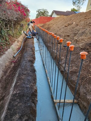 retaining wall - Hello, this is 96 feet long by four feet high. The owner of the cane used it to level the land and gain space. It was a great project. retaining wall - Hello, this is 96 feet long by four feet high. The owner of the cane used it to level the land and gain space. It was a great project.
