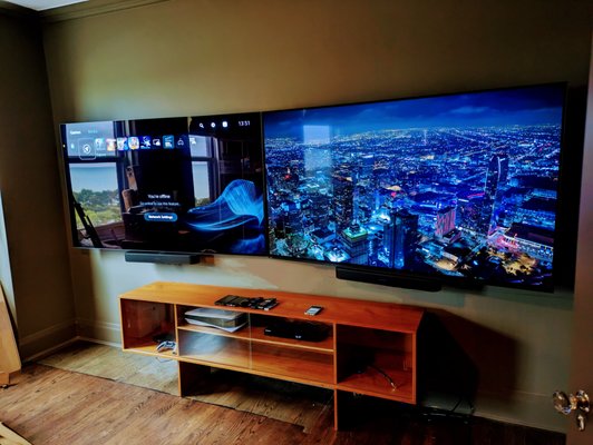 TV mounting - Client wanted 2 77in OLED tv's mounted side by side. One strictly for gaming and the other for movie/show watching. All cables were hidden in wall and all devices were connected to their respected tv. Client was ecstatic at the results.