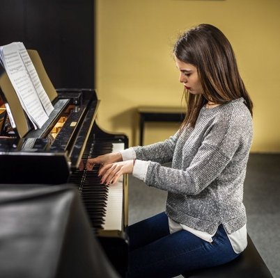 Student Elise M. Her original pieces performed by orchestra at Austins Long Center by age 14. - By age 14 student Elise M. had her original works performed by the orchestra at Austin's Long Center. Today she is a very successful full time piano teacher in the Austin area.