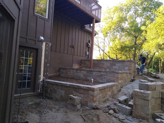 Landscaping With River Rocks, Step Stones, and Stone Walls - This project was done within 3 days. In this backyard, we added stone walls, stepping stones for a pathway, and additional landscaping.