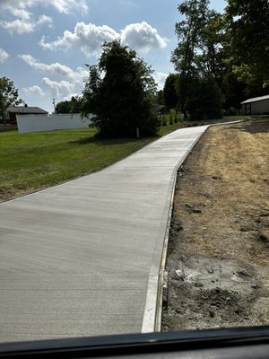 Excavation and concrete pad for garage with connecting 109ft driveway - Excavate for garage, 24x30concrete slab, 109’ft driveway Excavation and concrete pad for garage with connecting 109ft driveway - Excavate for garage, 24x30concrete slab, 109’ft driveway