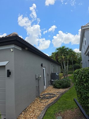 New job in Promenade East community full wrap black gutter with downs on home - full wrap black gutter and downspouts on home in Ft Myers Florida New job in Promenade East community full wrap black gutter with downs on home - full wrap black gutter and downspouts on home in Ft Myers Florida