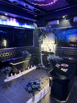 Proposal Decor! 💙 - This proposal was so beautiful and took place at a karaoke location in DC. The space we had was smaller so I needed a design that would add a wow factor without taking up too much space. My client let me know her favorite color was blue and gave me the creative freedom to handle the rest!!
Blue Roses themed surprise proposal! 💙 Proposal Decor! 💙 - This proposal was so beautiful and took place at a karaoke location in DC. The space we had was smaller so I needed a design that would add a wow factor without taking up too much space. My client let me know her favorite color was blue and gave me the creative freedom to handle the rest!!
Blue Roses themed surprise proposal! 💙