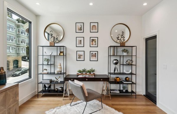 North Beach - For this condo, we have created a modern classy look. The space was carried out with a moody, sophisticated feel using dark grays and creams. Incorporating textured rugs throughout along with statement wall art has produced a high-end elevated composition. We have finished it off with a grand outdoor rooftop living area.