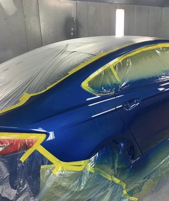 Custom Paint Job - Expert Color Matching:
We use paint-matching technology to ensure a seamless blend with your car’s original color. Our technicians carefully analyze your vehicle’s paint code and finish, so repairs are invisible and your car looks as good as new.
Surface Preparation:
Every paint job starts with meticulous surface prep. We sand, clean, and prime the area to guarantee maximum paint adhesion and a smooth, durable finish. Any imperfections, scratches, or chips are repaired before painting begins.
State-of-the-Art Spray Booth:
Your vehicle is painted in our dust-free, climate-controlled spray booth. This environment ensures an even application, prevents contamination, and produces a showroom-quality gloss.
Premium Paints and Materials:
We use only top-tier, environmentally friendly paints and clear coats from trusted brands. These products provide long-lasting protection against fading, chipping, and weather damage.
Multi-Layer Application:
Our technicians apply multiple coats of paint and clear coat, allowing each layer to cure properly for depth, durability, and a mirror-like shine.
Finishing Touches:
After painting, we carefully polish and buff the surface to eliminate any minor imperfections and bring out the full brilliance of the finish. The result is a flawless, glossy appearance that rivals factory standards. Custom Paint Job - Expert Color Matching:
We use paint-matching technology to ensure a seamless blend with your car’s original color. Our technicians carefully analyze your vehicle’s paint code and finish, so repairs are invisible and your car looks as good as new.
Surface Preparation:
Every paint job starts with meticulous surface prep. We sand, clean, and prime the area to guarantee maximum paint adhesion and a smooth, durable finish. Any imperfections, scratches, or chips are repaired before painting begins.
State-of-the-Art Spray Booth:
Your vehicle is painted in our dust-free, climate-controlled spray booth. This environment ensures an even application, prevents contamination, and produces a showroom-quality gloss.
Premium Paints and Materials:
We use only top-tier, environmentally friendly paints and clear coats from trusted brands. These products provide long-lasting protection against fading, chipping, and weather damage.
Multi-Layer Application:
Our technicians apply multiple coats of paint and clear coat, allowing each layer to cure properly for depth, durability, and a mirror-like shine.
Finishing Touches:
After painting, we carefully polish and buff the surface to eliminate any minor imperfections and bring out the full brilliance of the finish. The result is a flawless, glossy appearance that rivals factory standards.