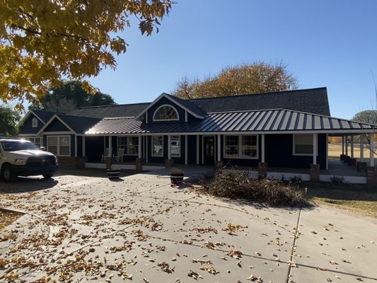New shingle roof with a standing seam metal roof add-on - A new shingle roof with a metal add on “standing seam”