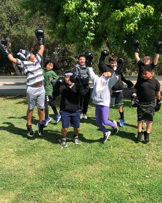Youth Boxing Classes - We offer youth classes in Monterey on Thursdays 4Pm and Saturdays 11Am. Drop-ins or memberships are available. Kids learn authentic boxing technique, apply it via partner drills, heavy bag work and pad work with the coach. Our coaches keep the kids active, focusing on agility, coordination as well as empowerment and confidence. 
Additionally, we offer classes through North County Recreation Center in Castroville. Please reach out for more information.